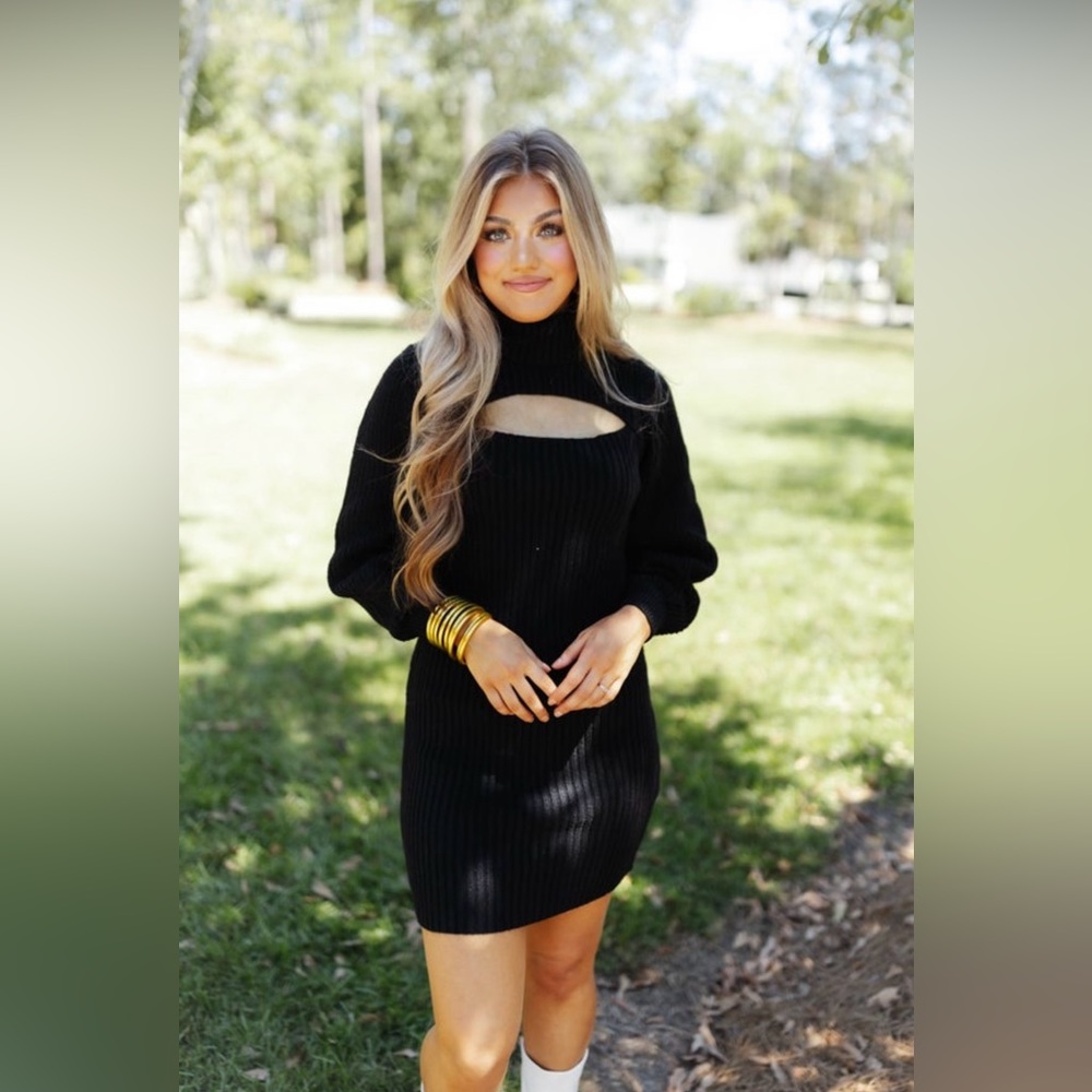 Black sweater dress with cutout